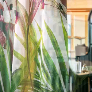 Digitally printed Vescom Chira sheer curtain, printed with a tropical floral pattern and a matte, woven look.