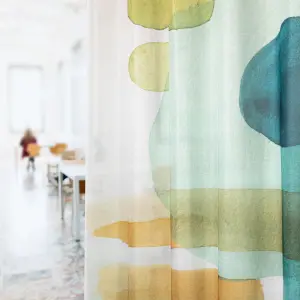 Vescom Swan sheer curtain with a matte finish and artistic watercolour print in a modern office