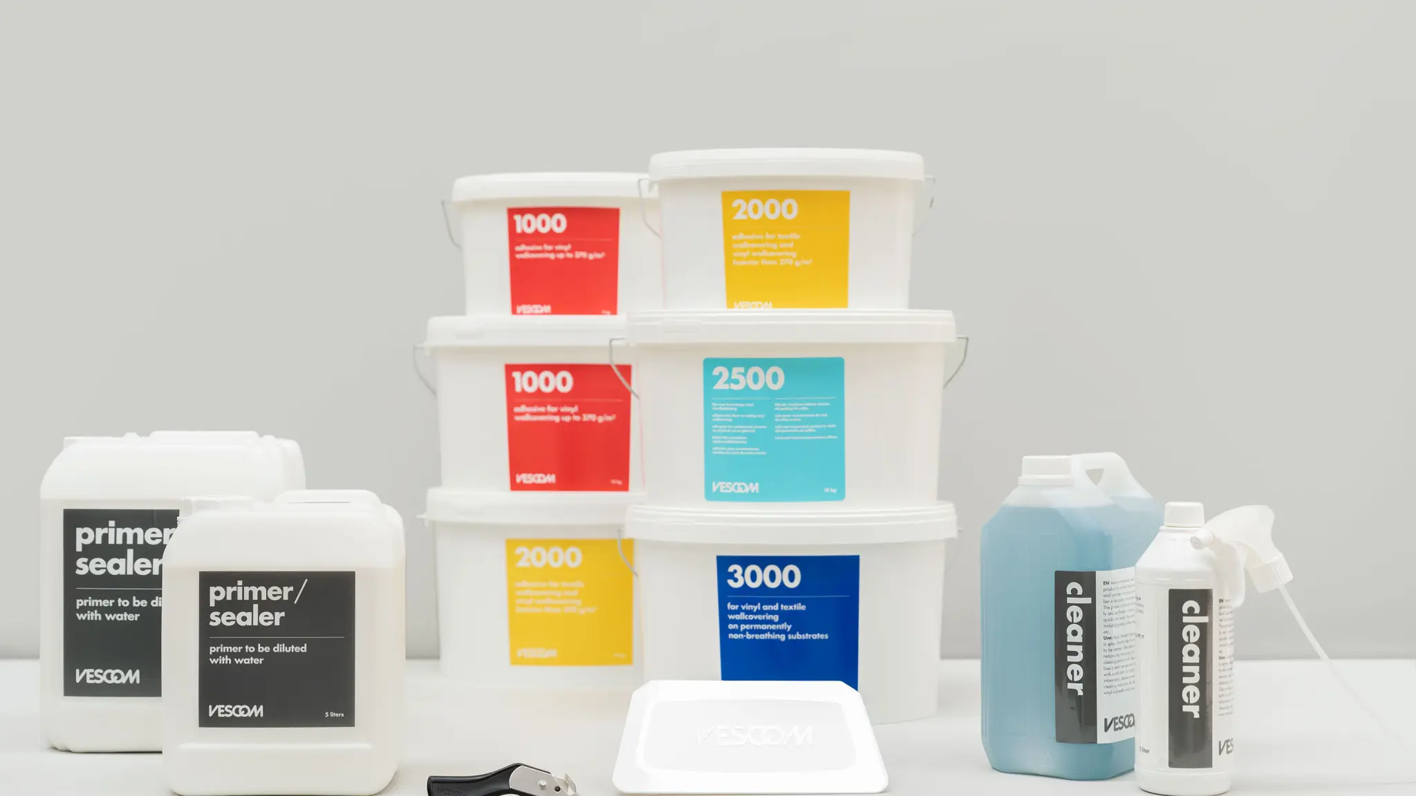 A professional range of Vescom adhesives, primer/sealer, and cleaner products for high-quality wallcovering installation.