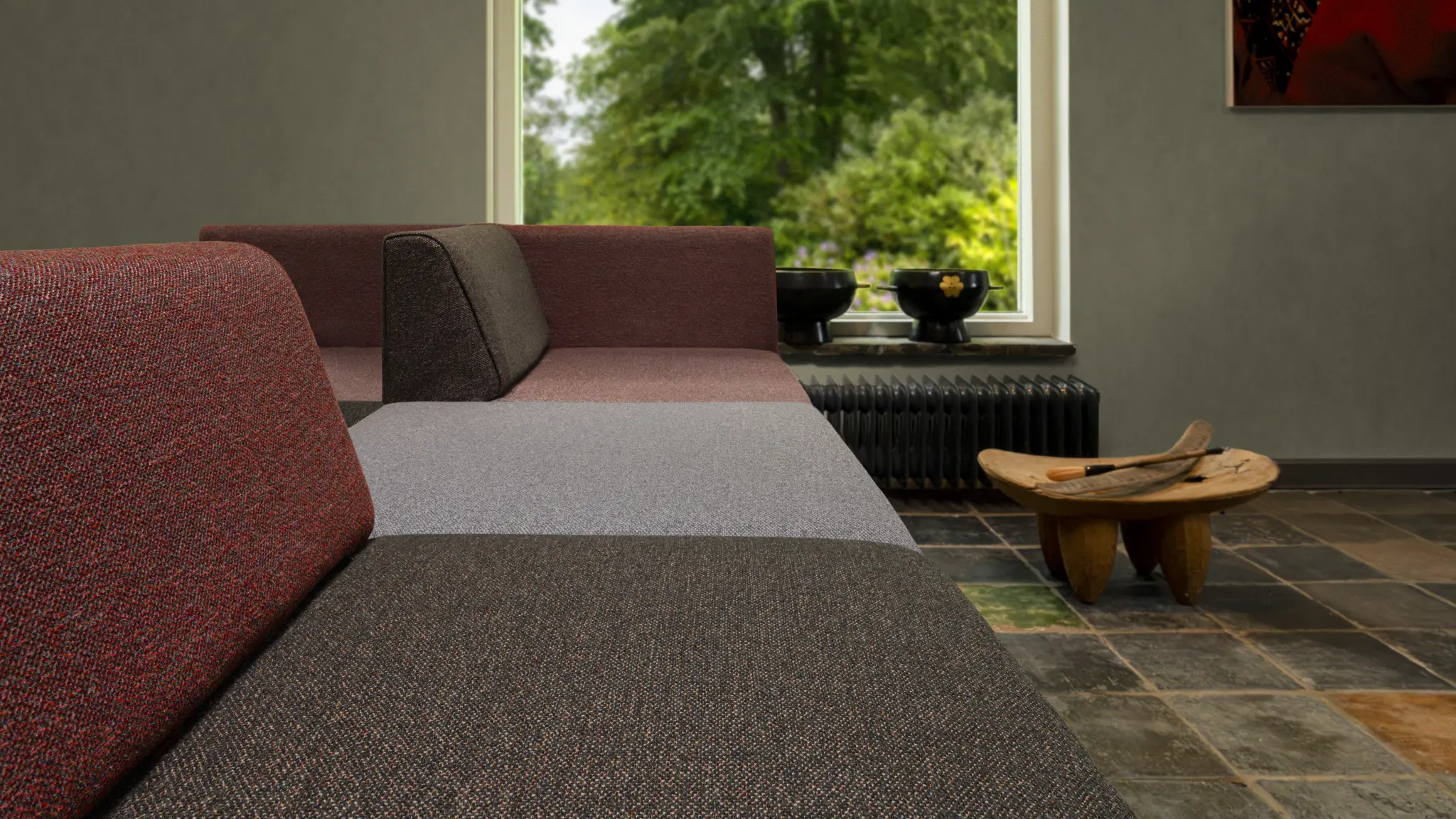 Vescom Bosco upholstery in contrasting muted tones styled with natural greenery.