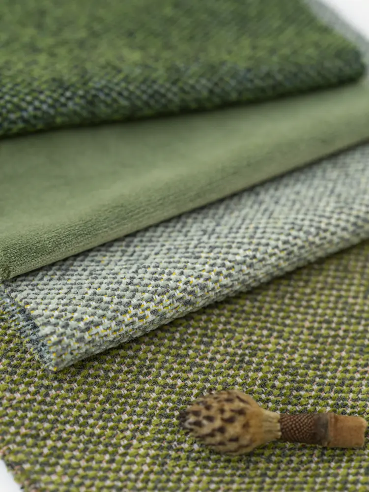 A tactile Vescom Bosco upholstery composition inspired by moss and woodland layers.