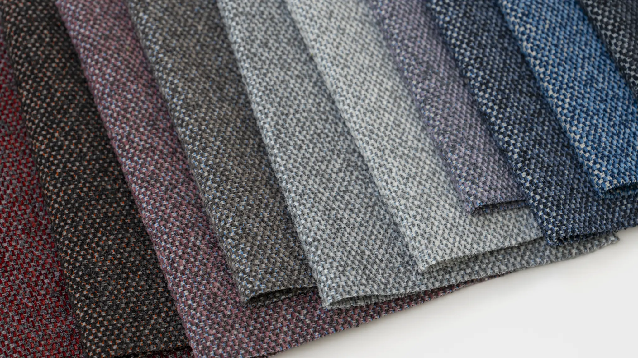 Vescom Bosco upholstery in dusky purple, blue and berry-inspired tones.