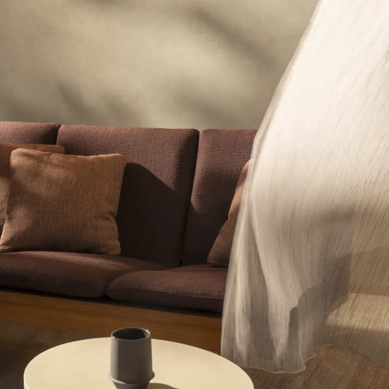 Laguna & Bay fabrics by Vescom used on upholstered furniture in an indoor-outdoor setting