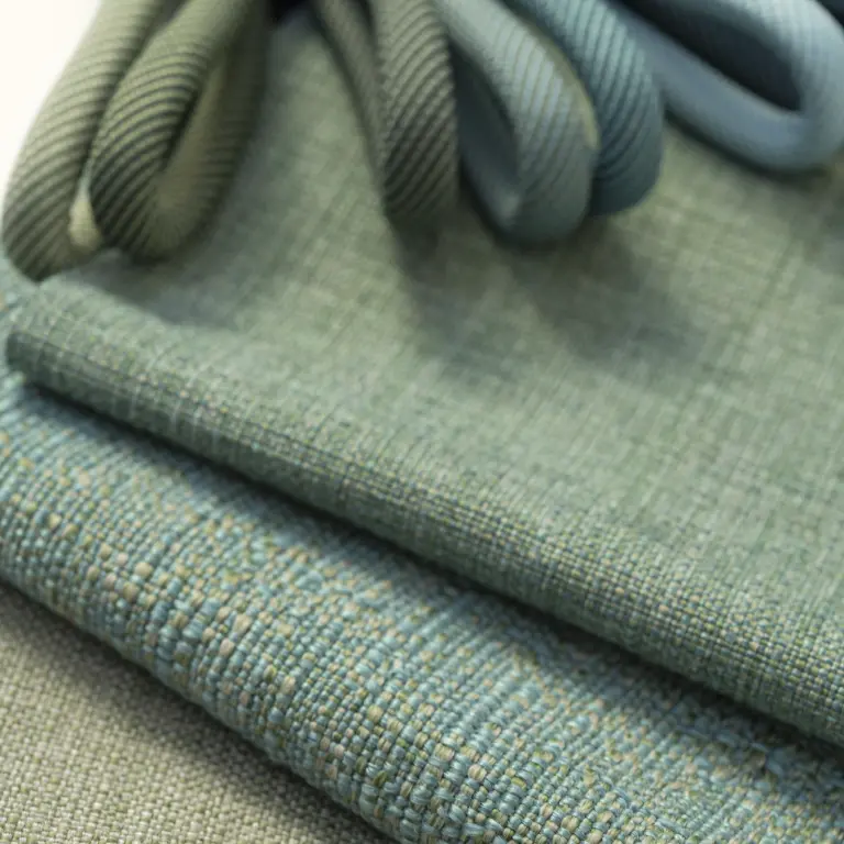 Laguna & Ba upholstery fabric by Vescom in green tones with open irregular structure
