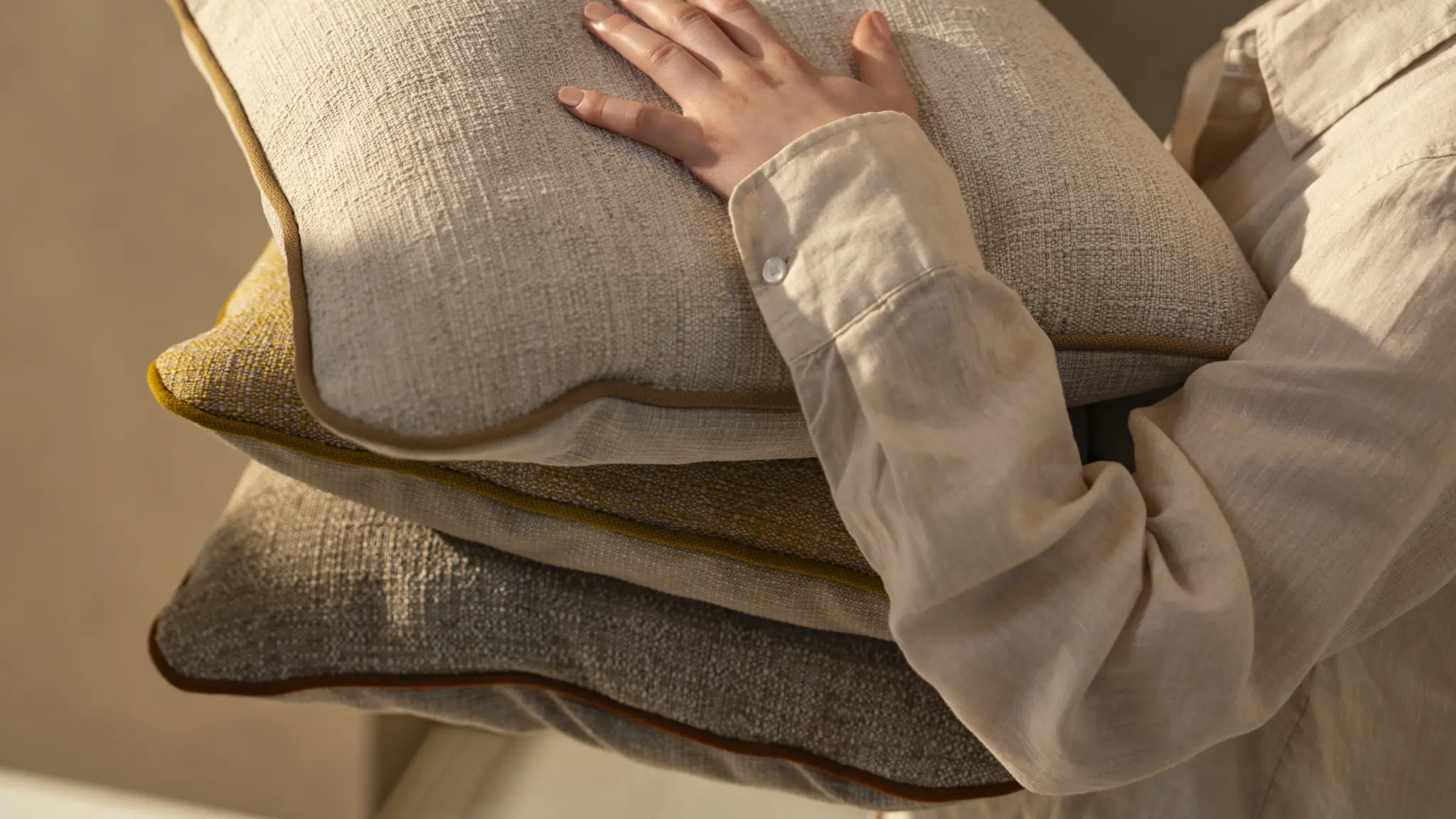 Laguna and Bay upholstery fabrics by Vescom on outdoor cushions with natural and melange textures