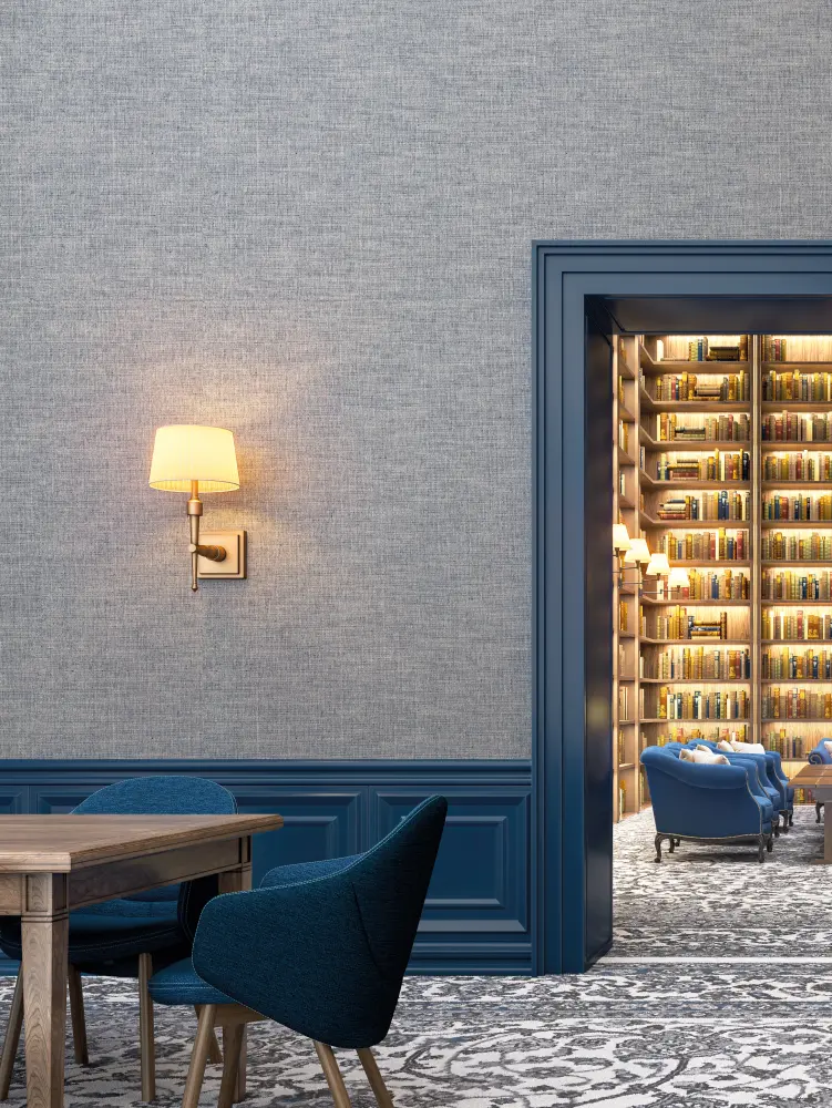 “Vescom Nivelis textile wallcovering with a two-tonal woven horizontal structure and subtle melange effect, shown on interior walls in a refined library lounge interior