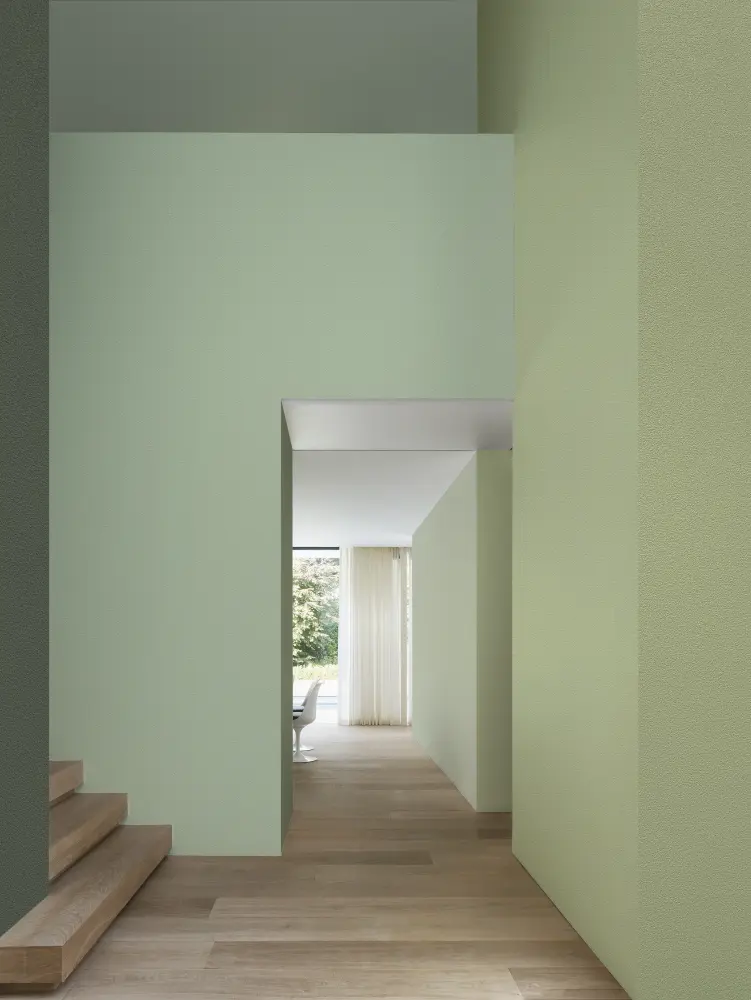 Vescom Colour Choice Soft Nature vinyl wallcovering in an interior with muted green tones and natural light