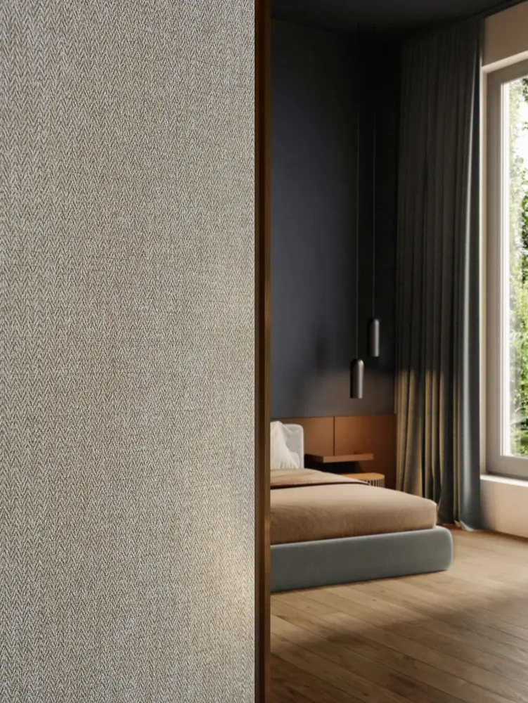 Vescom Harrison vinyl wallcovering adding a tailored herringbone texture to a warm interior space.