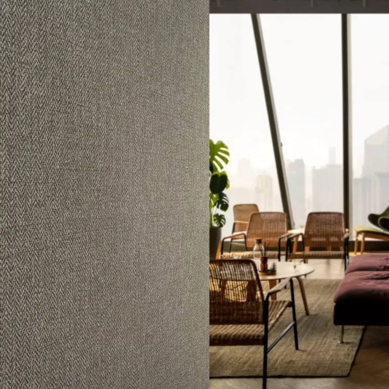 Vescom Harrison wallcovering used in a hospitality interior with warm lighting and a tailored sense of comfort.