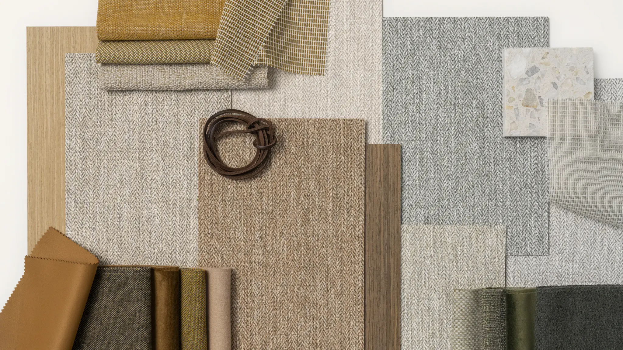 Vescom Harrison moodboard with herringbone vinyl wallcovering samples, colour references and tailoring-inspired material details.