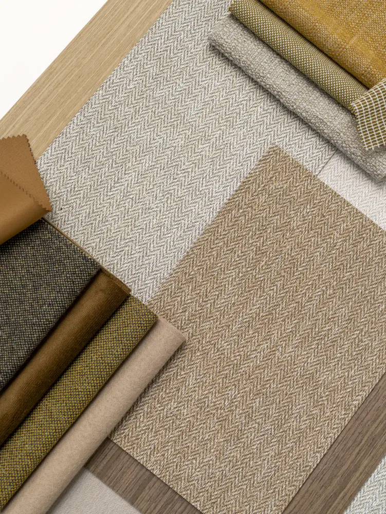 Vescom Harrison colour matching palette with herringbone wallcovering samples and rich suit-inspired shades.