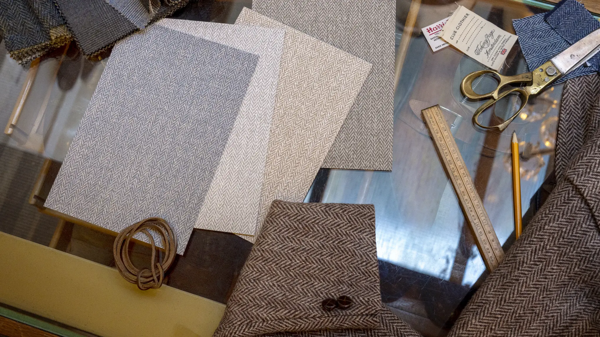 Vescom Harrison sample palette with neutral herringbone wallcovering colours and soft material combinations.