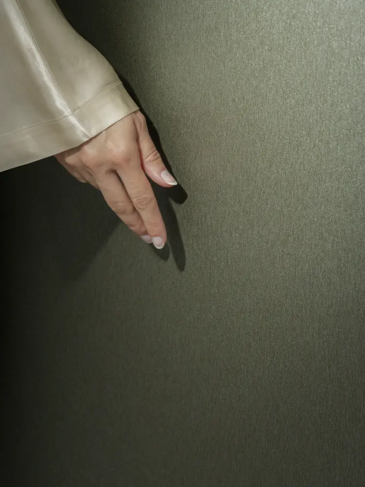 Vescom Stellar vinyl wallcovering in a muted mineral colour with elegant hand and light reflection.