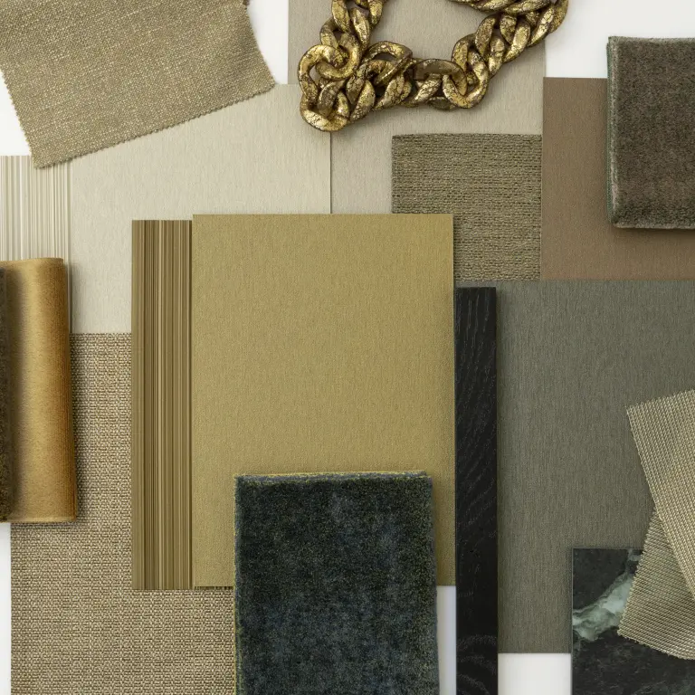 Vescom Stellar wallcovering samples shown in an interior moodboard with metallic tones, panels and material details.