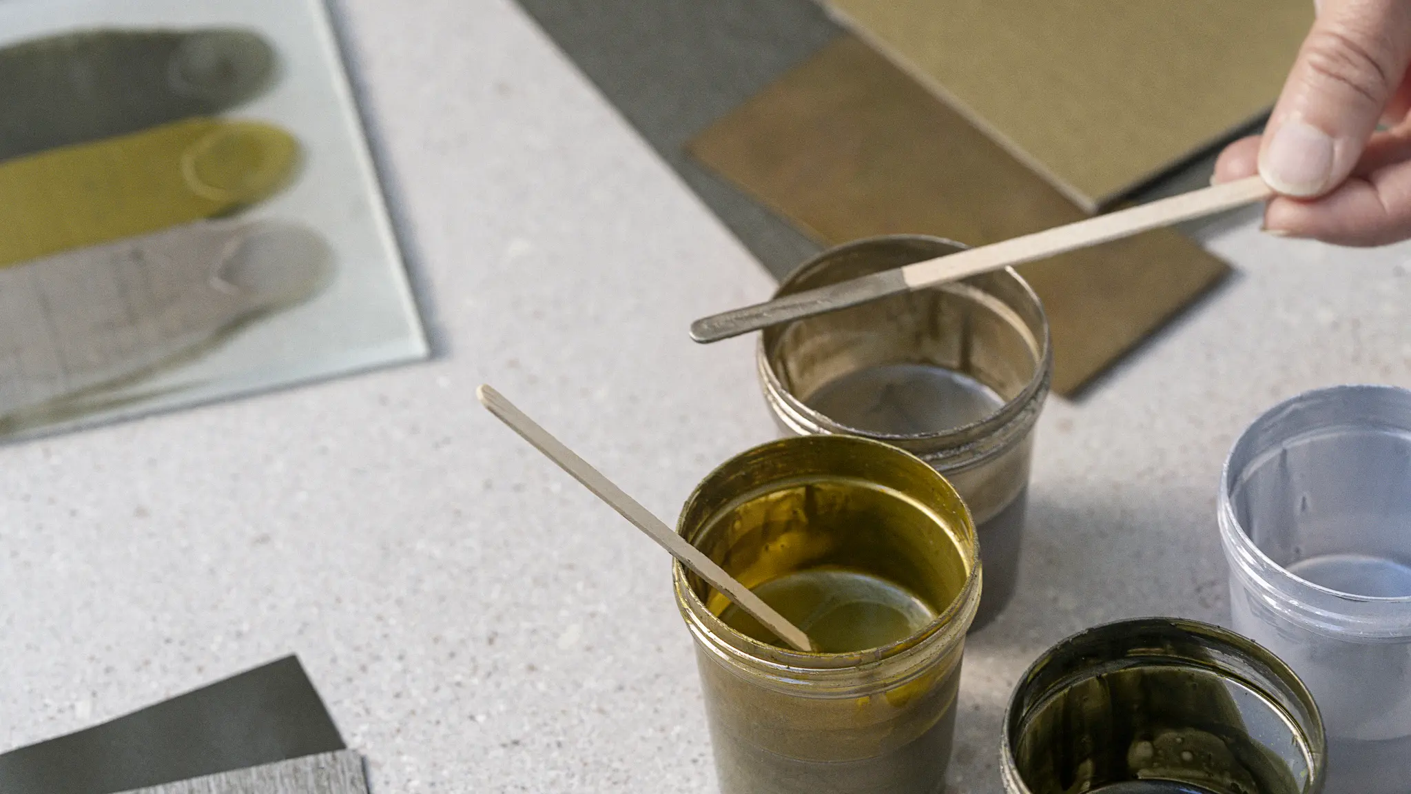 Vescom Stellar inspiration palette with vinyl wallcovering samples, colour references and metallic mineral tones.