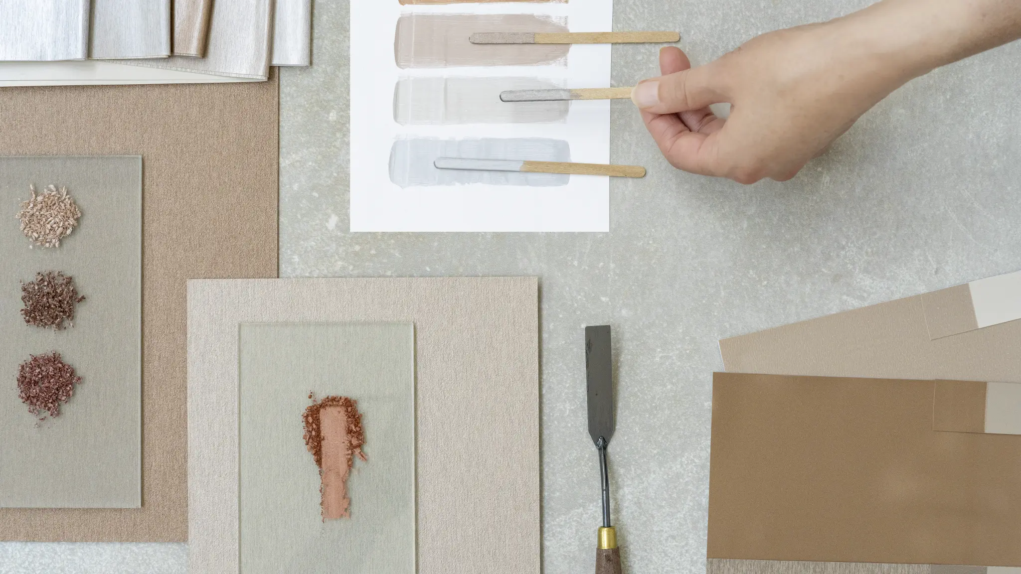 Vescom Stellar material board with colour cards, wallcovering samples and subtle mineral references.